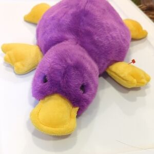 Purple and Yellow Plush Duck Toy